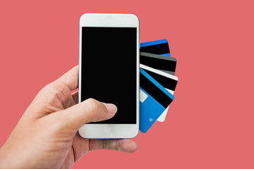 hand using mobile phone credit card, online shopping concept isolated white