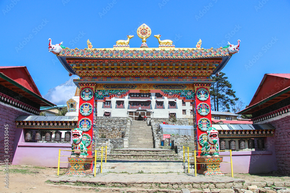 Tengboche Monastery (or Thyangboche Monastery), also known as Dawa Choling Gompa. View of entrance to the tibetan buddhist monastery of the Sherpa community. - obrazy, fototapety, plakaty 