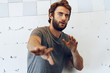 © fotofabrika - Portrait of Expressive young  bearded man scared and nervous