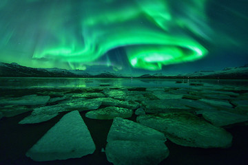 blue iceberg floating,Jokulsarlon Lagoon in Iceland at Sunset ,Icebergs in Jokulsarlon glacial lagoon. Vatnajokull National Park, southeast Iceland, Europe. Landscape photography,lceland