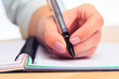 © Fototocam - female hands write in a notebook . Office place . Close up view  - Image