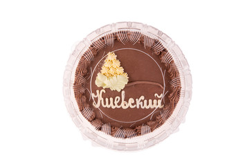 Kiev cake with chocolate cream in packaging