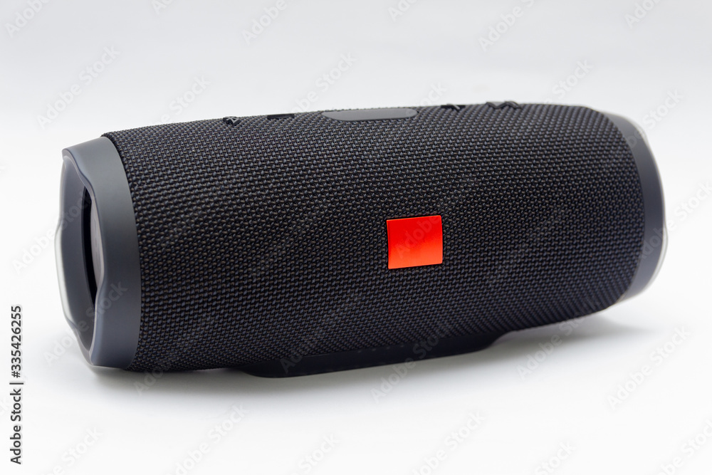 Black portable bluetooth speaker, with all-weather protection. - obrazy, fototapety, plakaty 