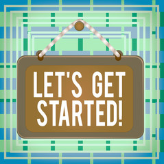 Wall Mural - text sign showing let get started. business photo text encouraging someone to begin doing something 