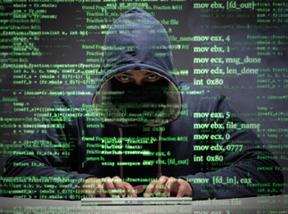 young hacker in data security concept
