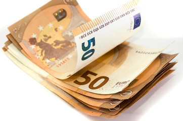 stack of 50 euros on a white background.