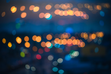 Wall Mural - abstract blur defocused night bokeh light in urban background.