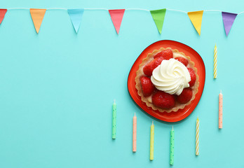 Wall Mural - Birthday cake with strawberries and whipped cream.