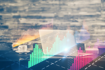 Stock market chart hologram drawn on personal computer background. Double exposure. Concept of investment.