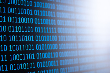 Wall Mural - blue binary code on screen of the computer