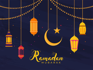 Wall Mural - Islamic Holy Month of Ramadan Concept with Hanging Illuminating Lanterns, Moon, and Star on Blue Background.