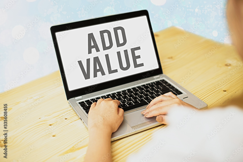 Writing note showing Add Value. Business concept for an improvement or ...