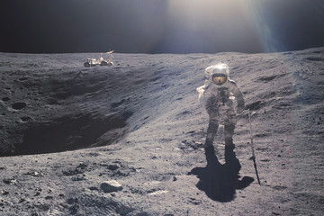 Wall Mural - astronaut on rock surface with space background. elements of this image furnished by nasa