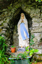 Virgin Mary Statue At A Grotto At A Holy Shrine