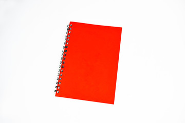 Wall Mural - Red color covered single note paper diary isolated on a white background