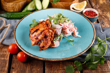 Fried veal or beef ribs and vegetables dipped in sour cream.