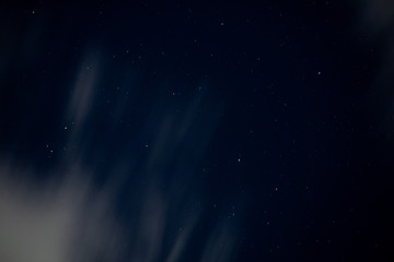 Blue Sky with stars and clouds