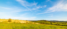 Green Hill Under A Blue Sky In The Sardinian County Side