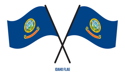 Two Crossed Waving Idaho Flag On Isolated White Background.