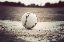 Baseball Sitting On A Base