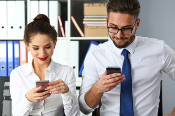 Group of people look at phones in arms at office portrait. Read news mania send sms chat addict use electronic bank modern lifestyle idea job plan colleague share blog tweet web search concept