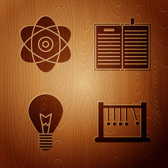 Wall Mural - Set Pendulum, Atom, Light bulb with concept of idea and Open science book on wooden background. Vector