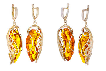 Wall Mural - Amber jewelry earrings. Baltic amber. Isolated image.