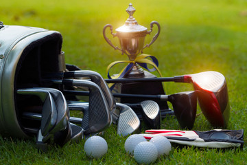 Wall Mural - Closeup old golf bags on green.