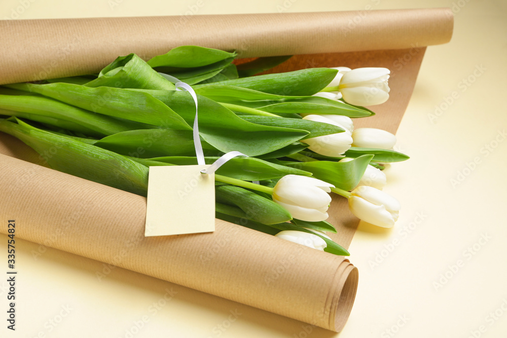 Bouquet of beautiful flowers on color background