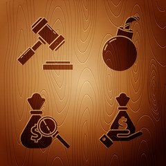 Poster - Set Hand holding money bag, Judge gavel, Money bag and magnifying glass and Bomb ready to explode on wooden background. Vector