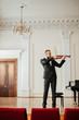 © alfa27 - young caucasian talented violinist play violin, handsome guy in formal suit perform classical music, practice before performance