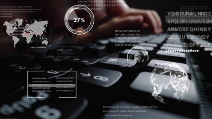 man working on laptop computer keyboard with graphic user interface gui hologram showing concepts of