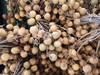 Wall Mural - Dimocarpus longan sweet fruit on the basket in the supermarket