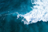 Surfer at the top of the wave