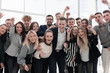© ASDF - team of cheerful young people looking at the camera