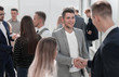 © ASDF - business people shaking hands with each other