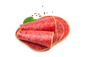 Salami slices isolated on white background.