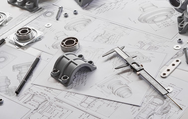 Fototapete - Engineer technician designing drawings mechanical parts engineering Engine.manufacturing factory Industry Industrial work project blueprints measuring bearings caliper tools