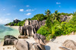 © JCB - Tropical beach with palm trees and rocks on the island of La Digue, Seychelles, Africa