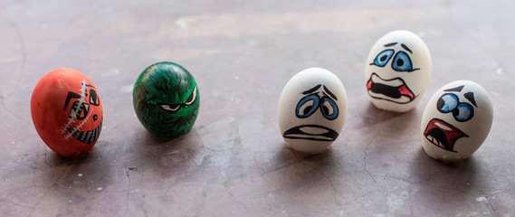 Eggshells painted as face animation to represent Corona virus and the victims. Animation art and object photography.