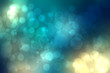 © Olga - Abstract gradient of dark blue yellow turquoise pastel background texture with glowing circular bokeh lights. Beautiful colorful spring or summer backdrop.