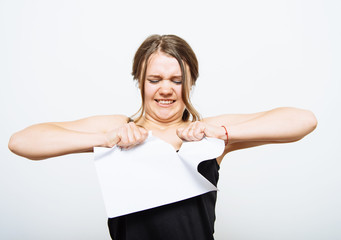 young woman breaks the paper