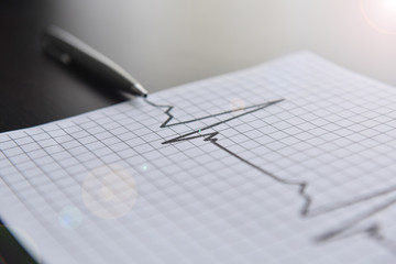 Business chart and pen. Pulse and business. Business concept pen and chart.