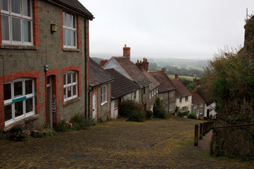 Poster - Shaftsbury (England), UK - August 07, 2015: The Gold Hill road and houses in Shaftsbury, England, United Kingdom.