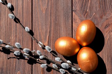 Wall Mural - Easter eggs on brown wooden background