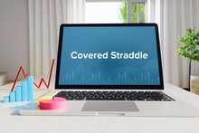 Covered Straddle – Statistics/Business. Laptop In The Office With Term On The Screen. Finance/Economy.