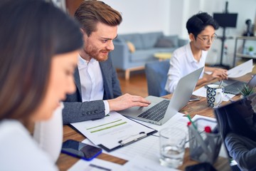 Group of business workers working together at the office