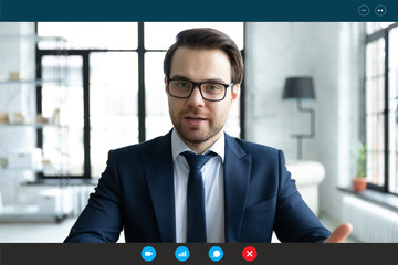 Wall Mural - head shot employer lead job interview with applicant laptop screen teleconference app view. business