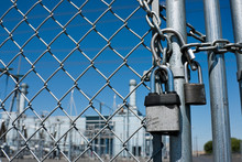 Gas Power Plant Behind Fence And Locked Gate