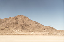 Desert Mountain On Dry Lakebed